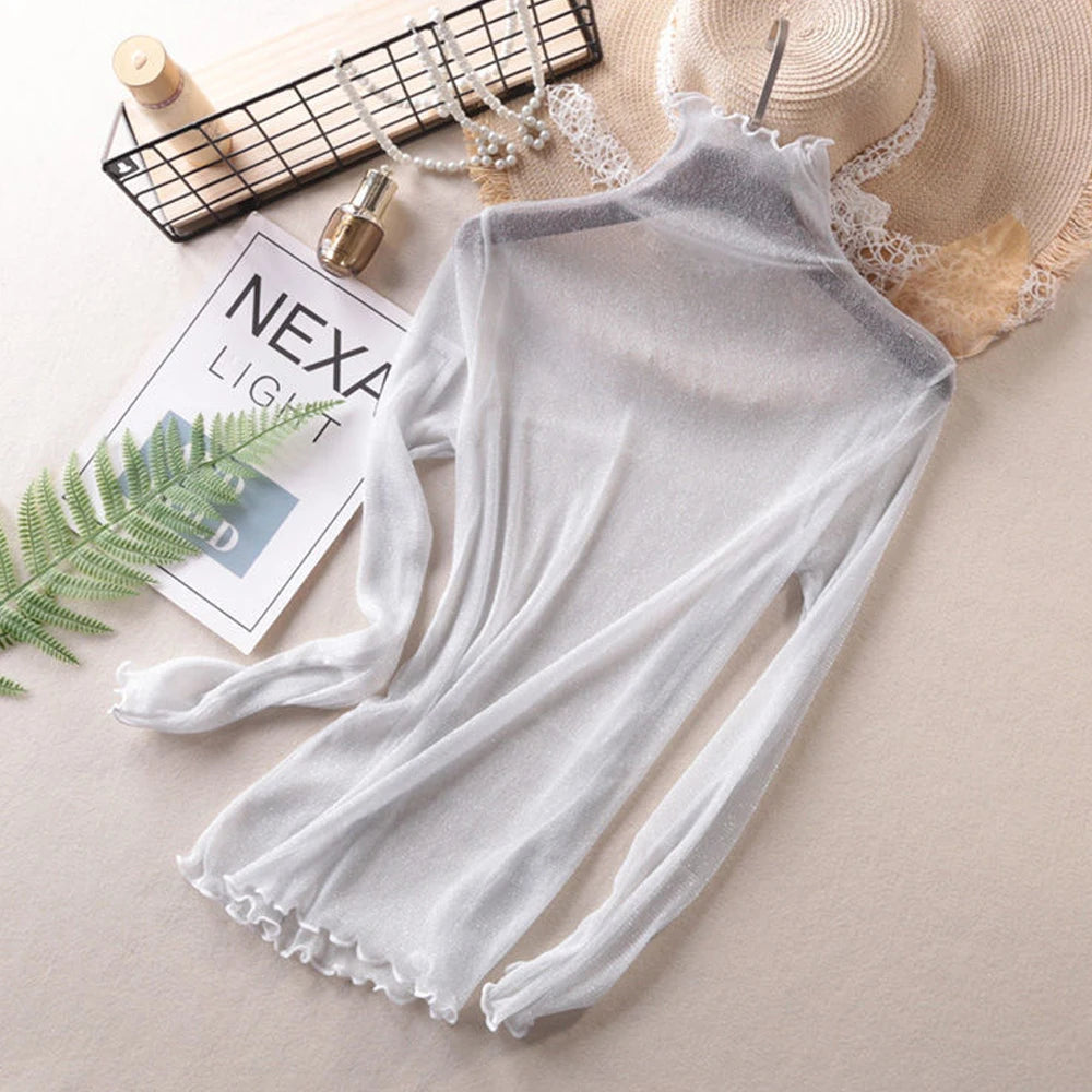 Błyszcząca przezroczysta damska bluzka