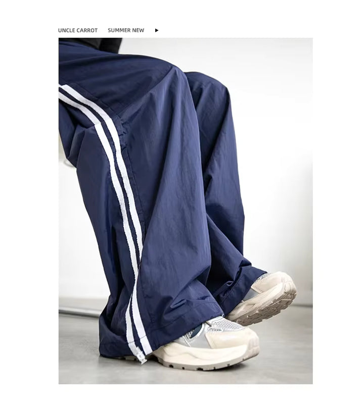 Szerokie dresy damskie z paskami