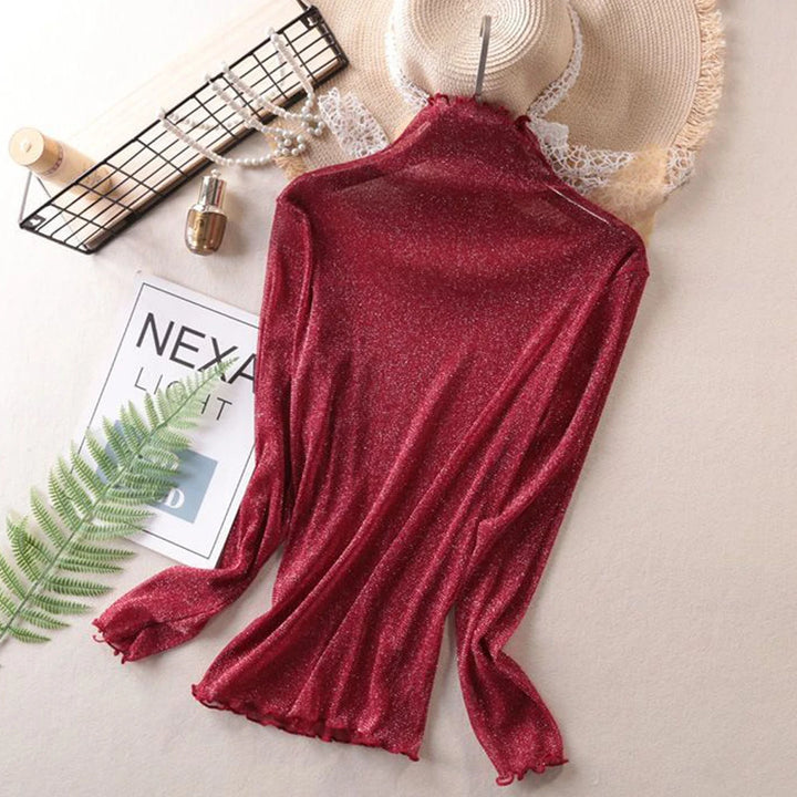 Błyszcząca przezroczysta damska bluzka