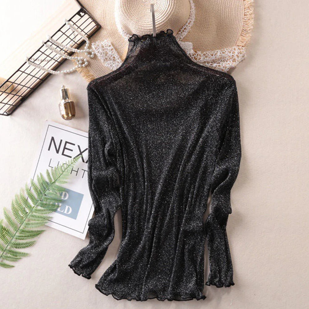 Błyszcząca przezroczysta damska bluzka