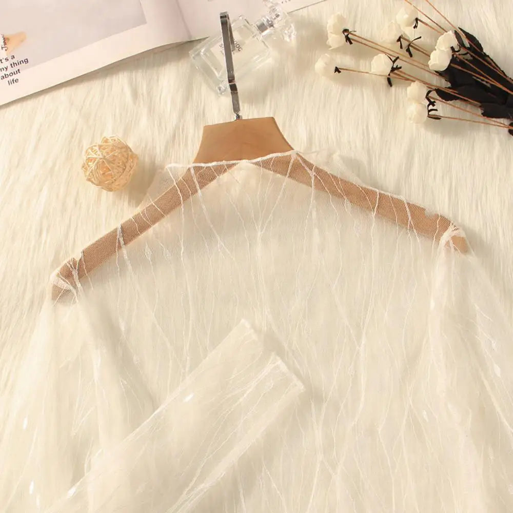 Prześwitująca damska bluzka ze wzorem