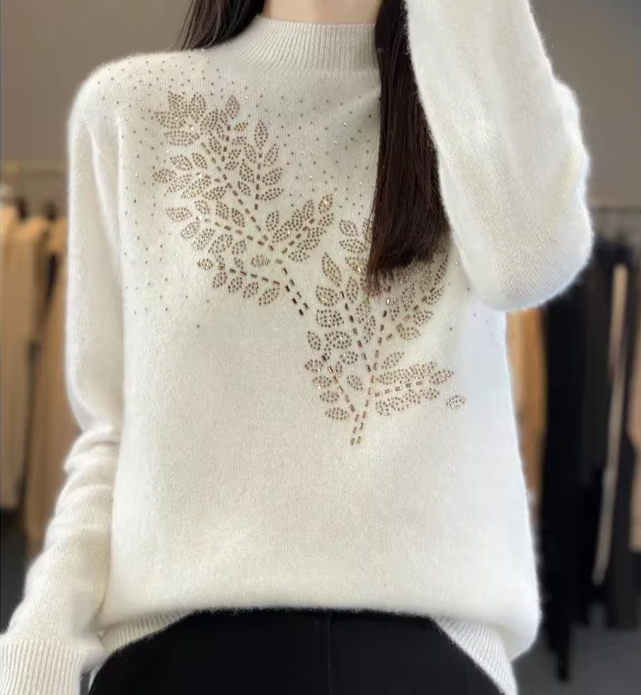 Sweter damski z ozdobnymi cekinami