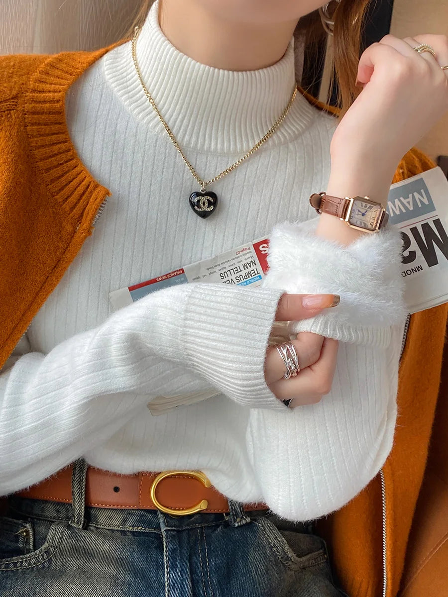 Sweter z ozdobnym futerkiem